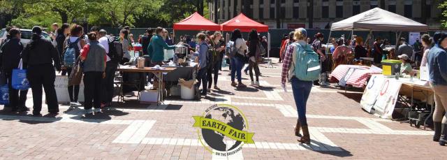 event on NCSU quad with people and tents